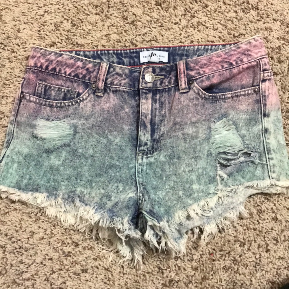 Tie dye distressed jean shorts.